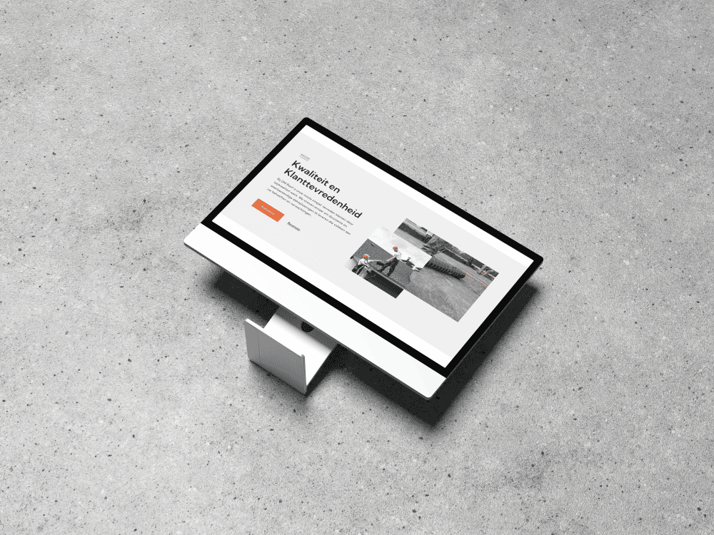 Een Macbook mockup van de DM Roof Website