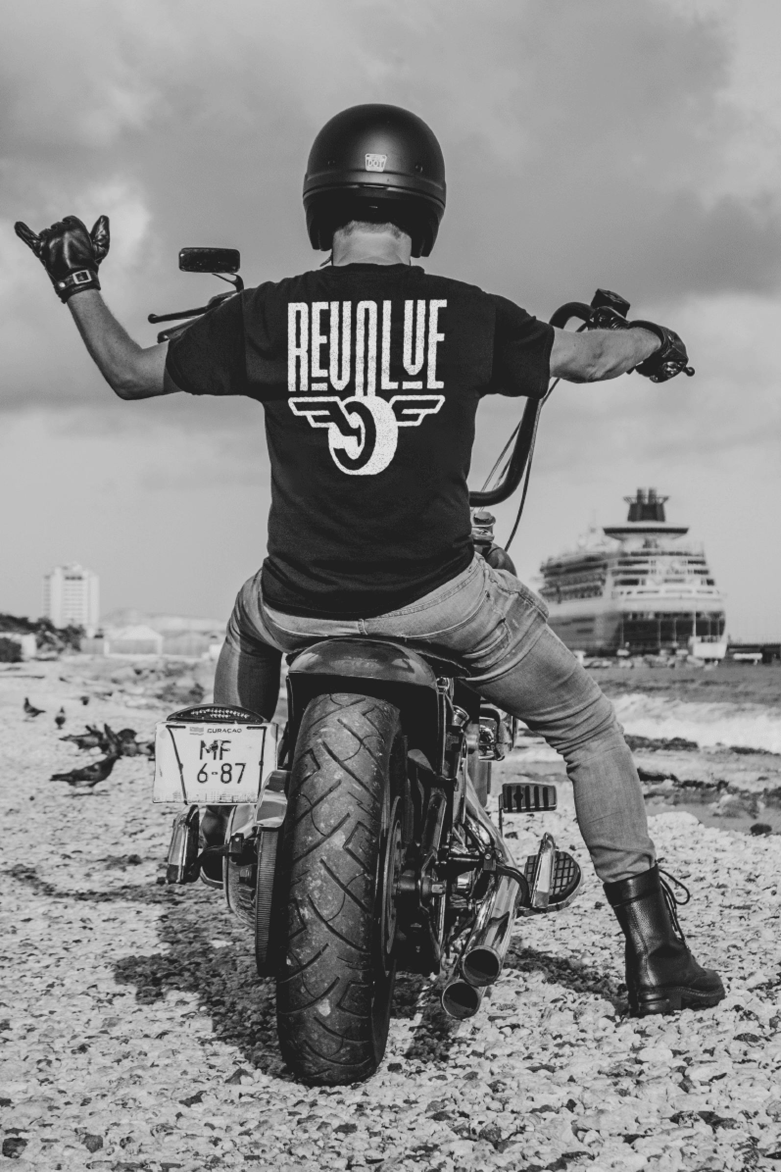 A biker wearing a Revolve Tee
