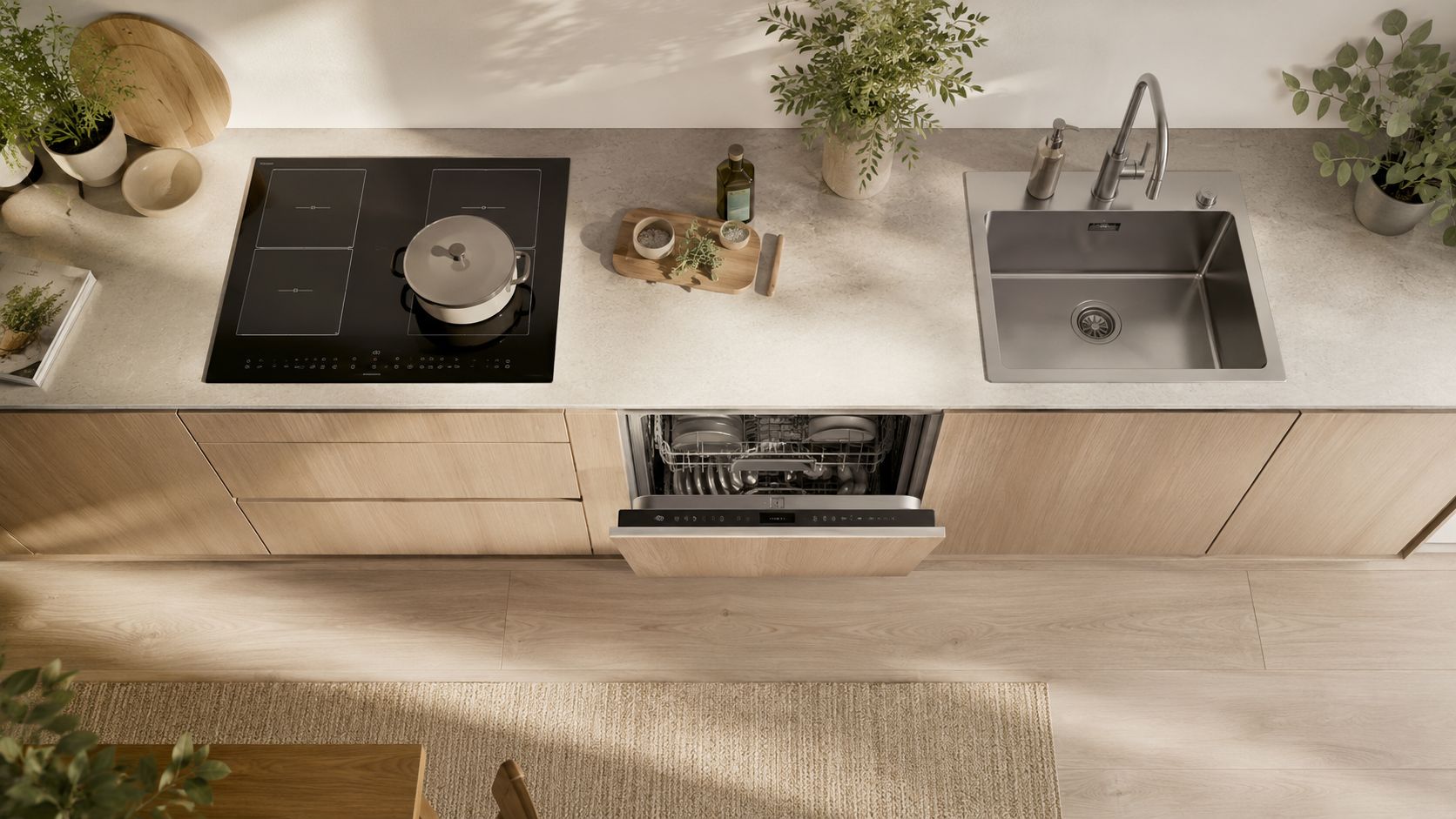 A modern minimalist kitchen featuring a wooden countertop, built-in induction stove, stainless steel sink, and an open dishwasher.