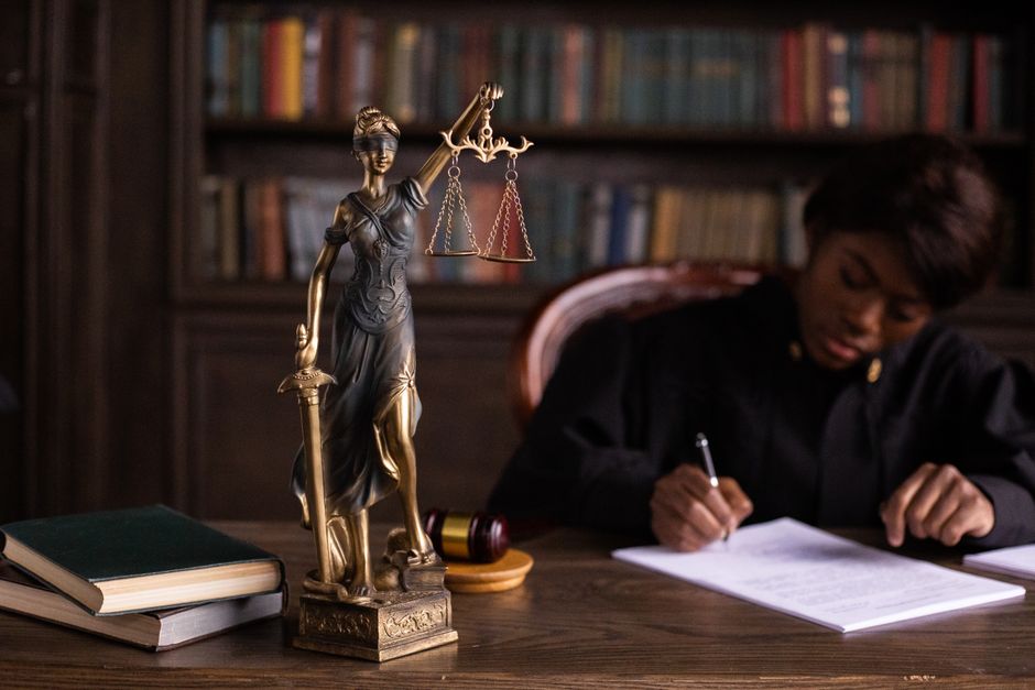Gavel resting on open law books