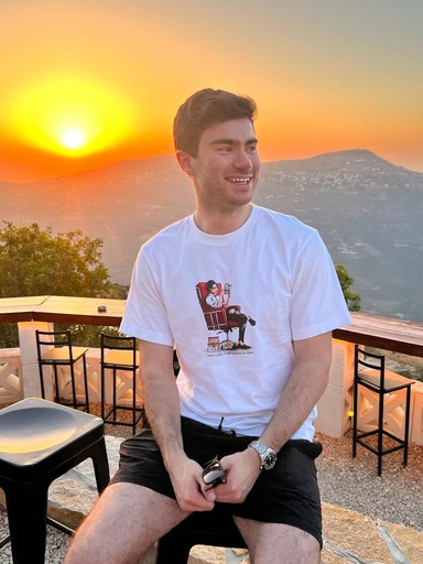 persona portrait image man with orange background and person's image on top