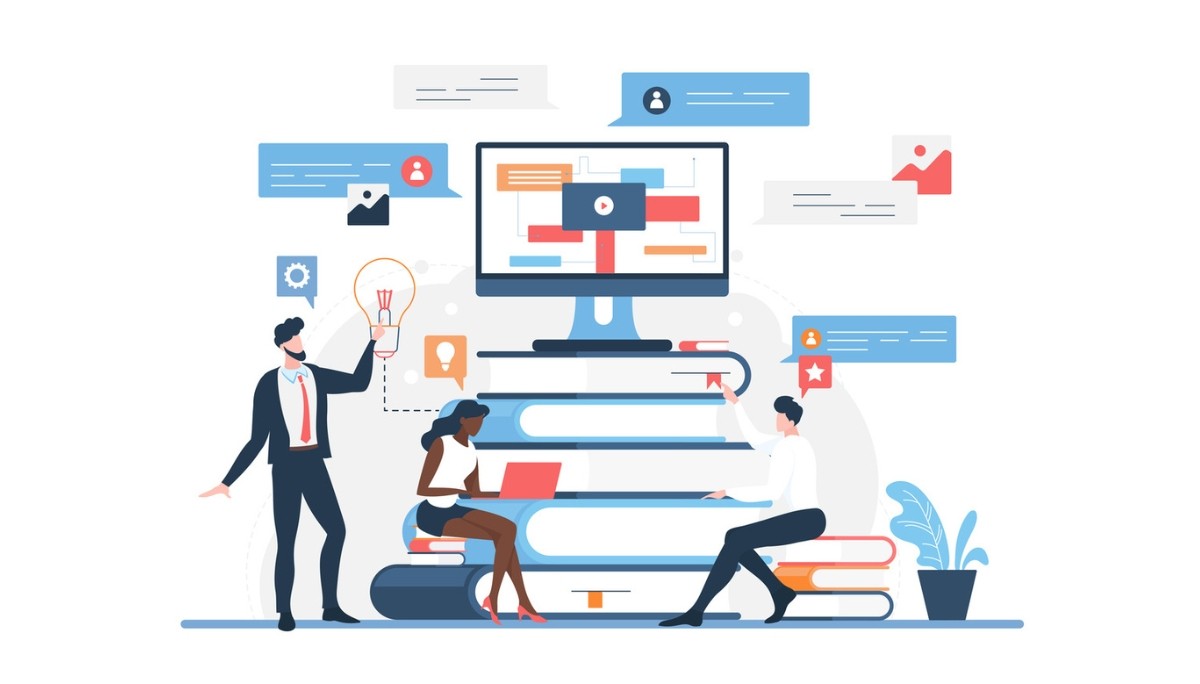 Illustration of three people collaborating around a large computer screen with floating icons and books.