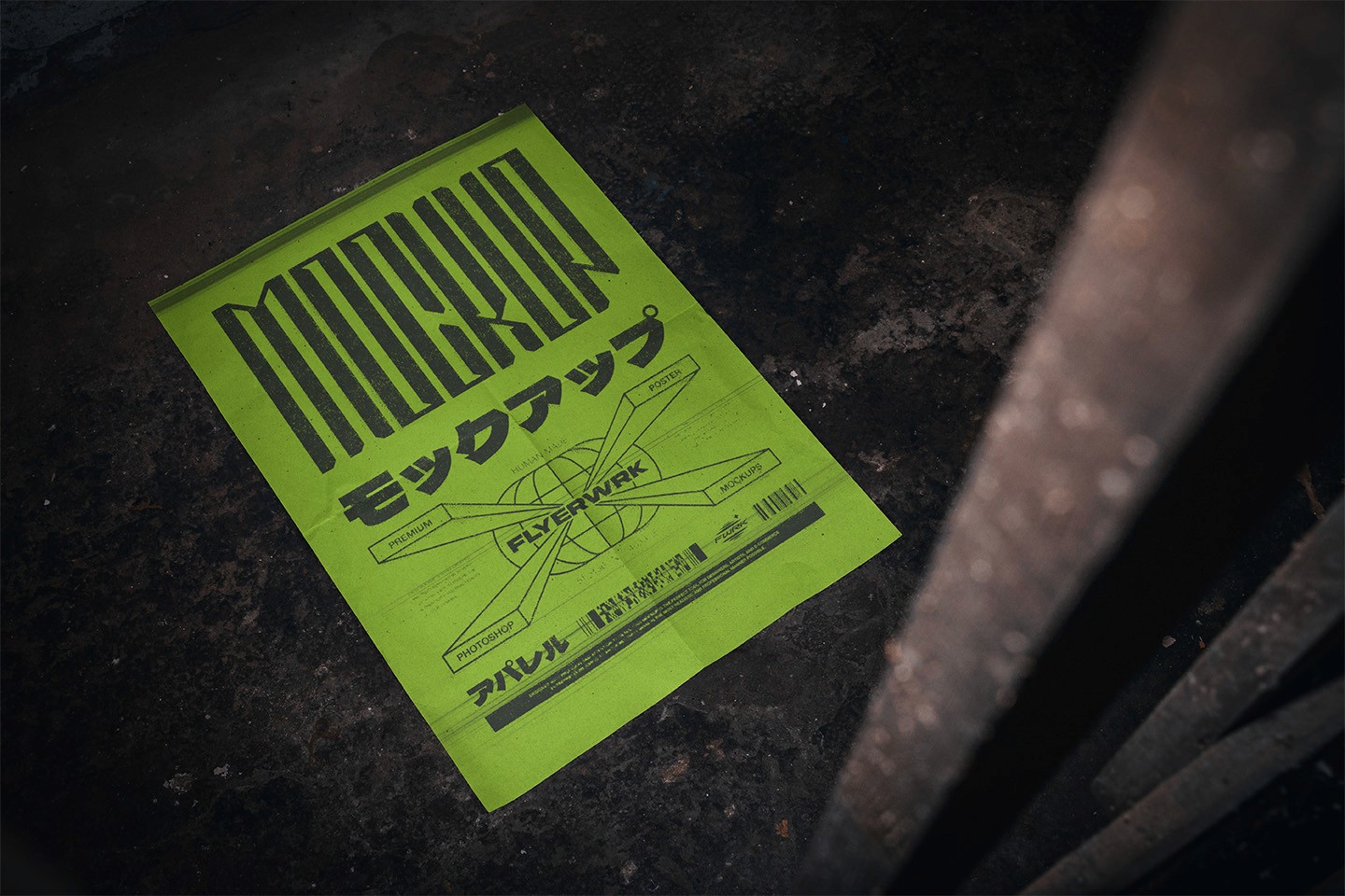 Basement A2 Poster Mockup displaying a vibrant neon green anti-design poster on a dark floor