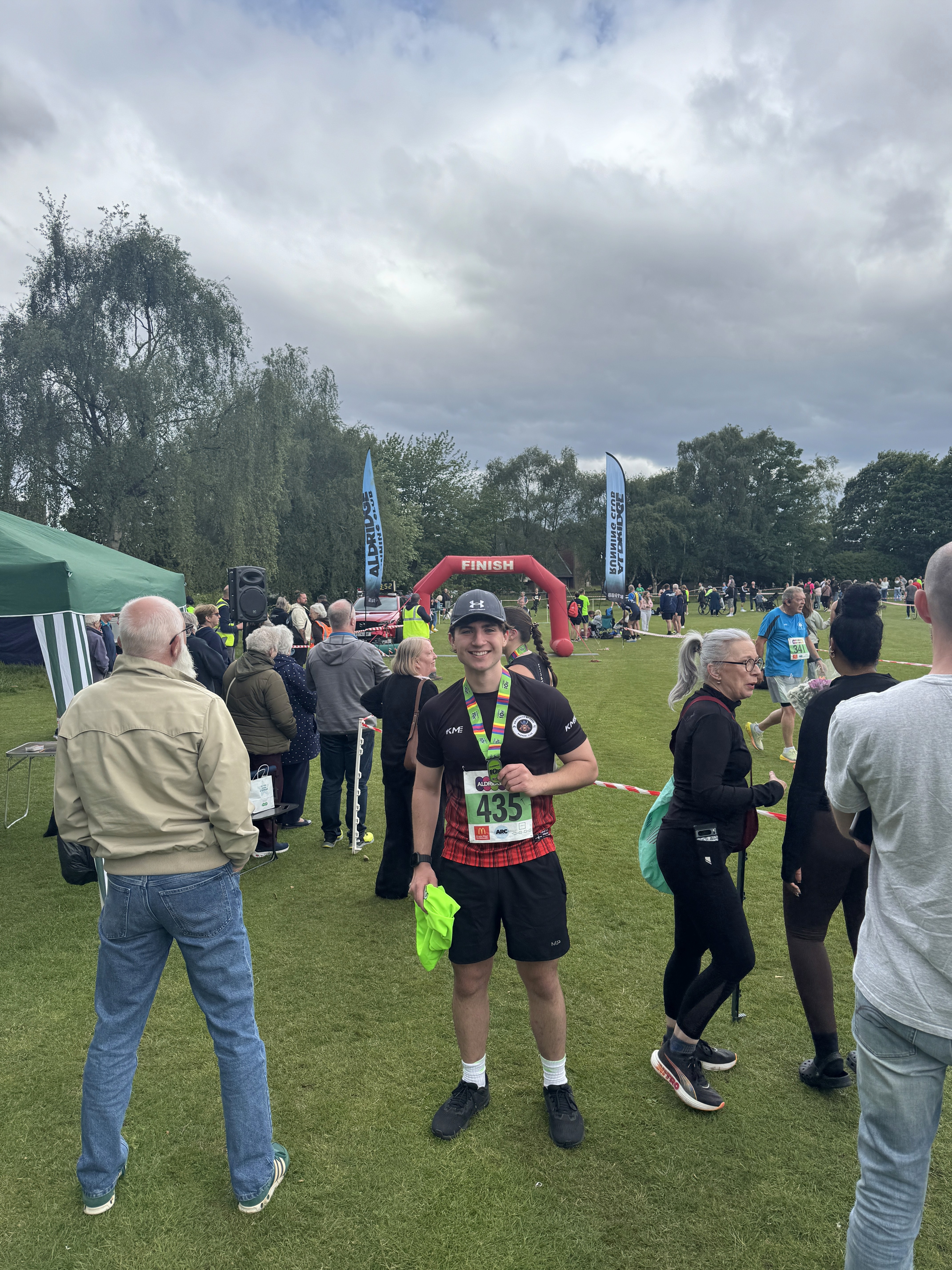 husband and wife working happily on a laptop