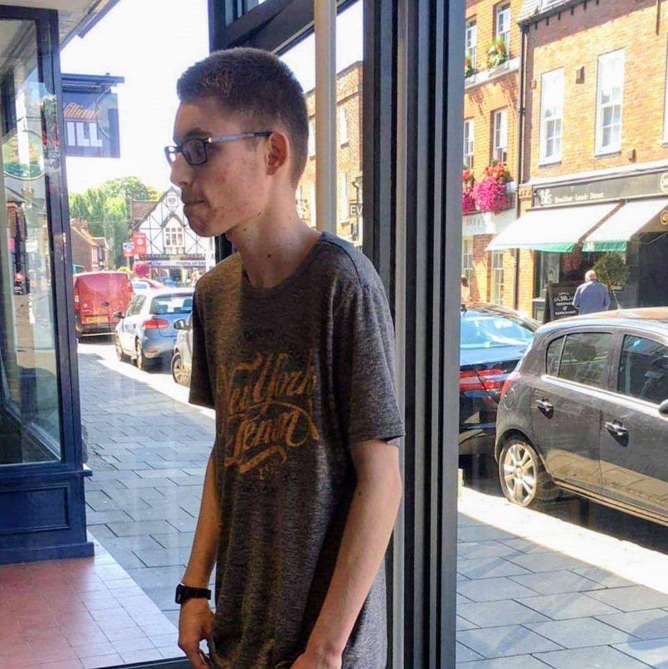 man wearing black crew-neck top