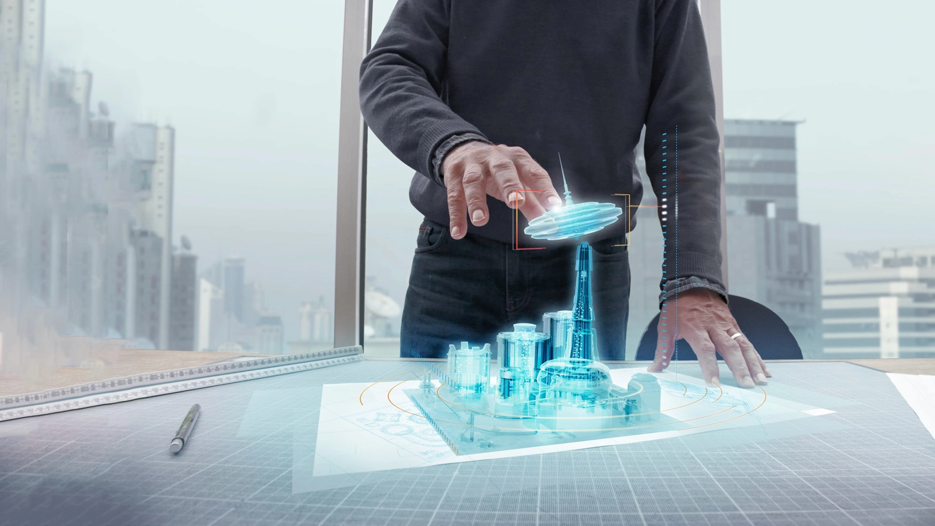 Architect interacting with a holographic 3D model of a building complex above a drafting table