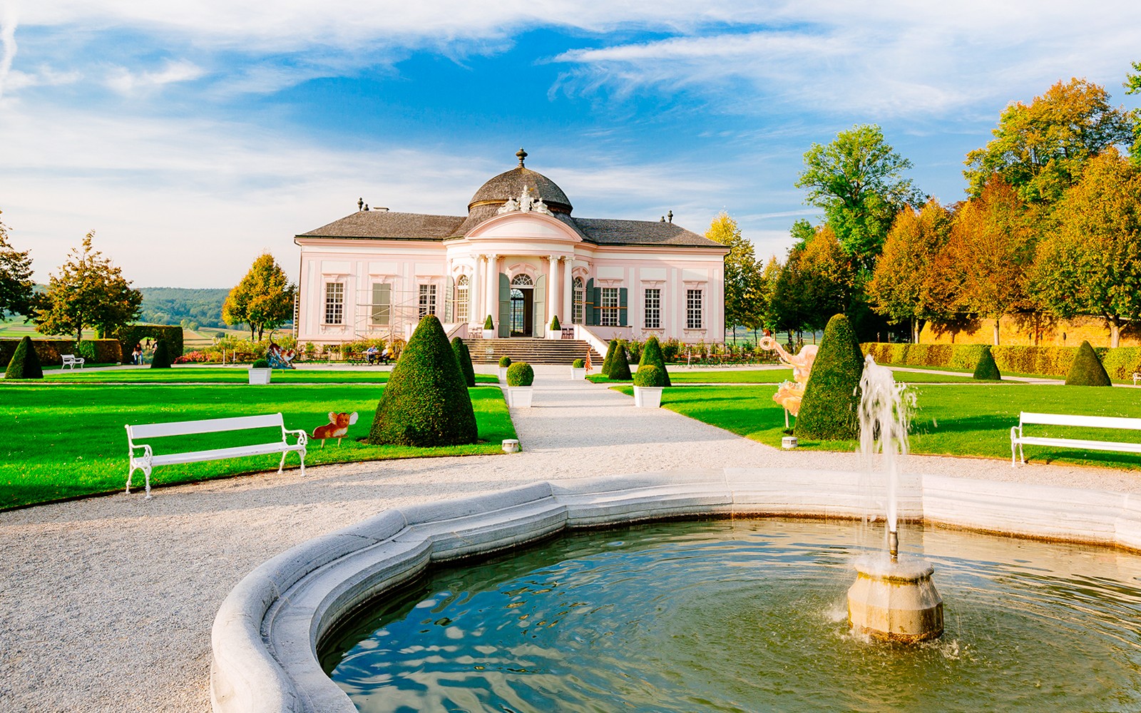 Elegant pavilion and fountain in a manicured garden, Danube Valley day trip from Vienna.