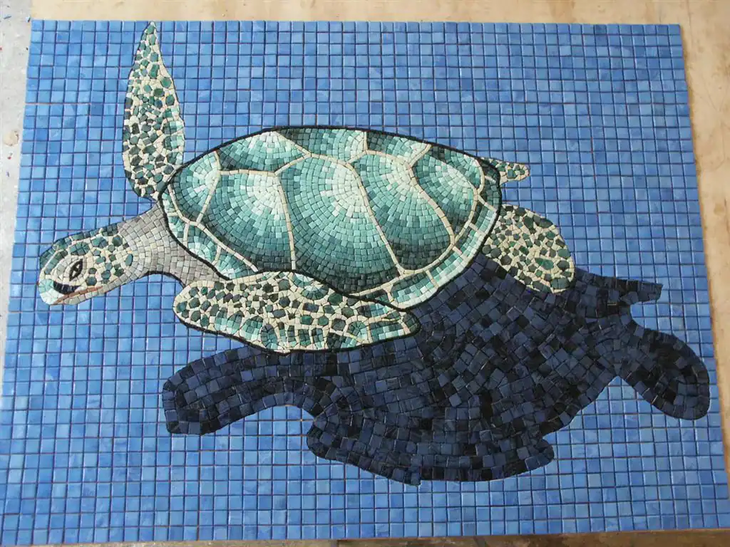 Custom turtle mosaic for pool decoration by Mosaiclegs Art Studio.