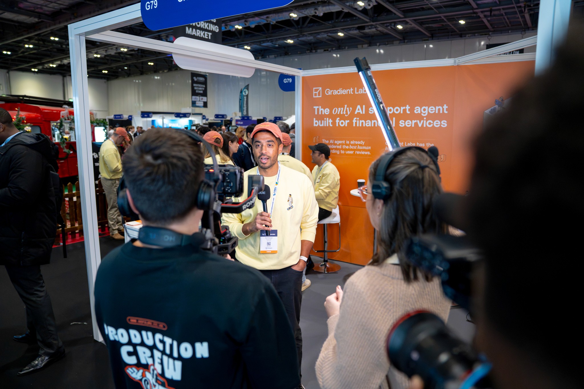 Black cosmetic product bottle against a dark background