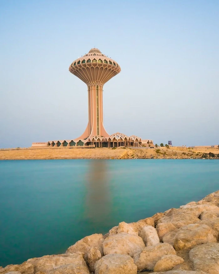 white umbrella on seashore