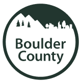 Boulder County logo with mountain, trees, and city skyline silhouette