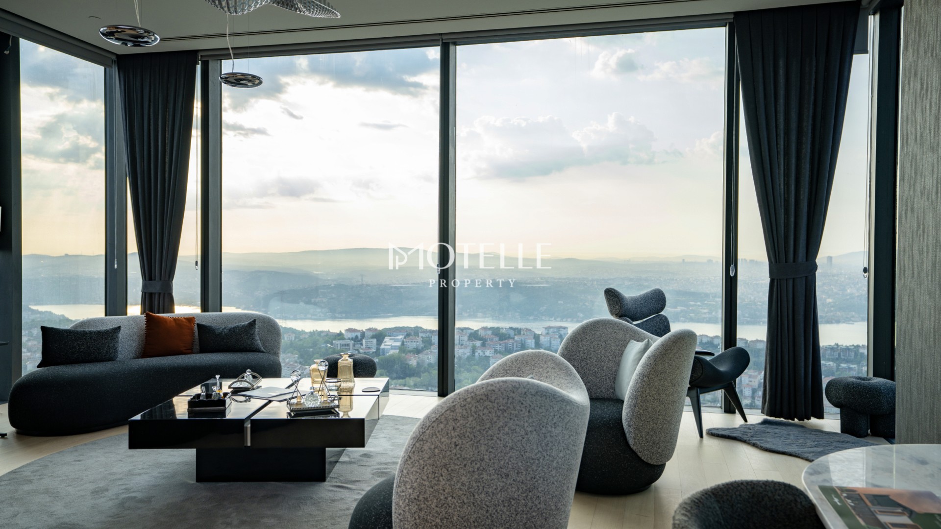 Luxury living room in Çiftçi Towers Istanbul with floor-to-ceiling windows and Bosphorus view