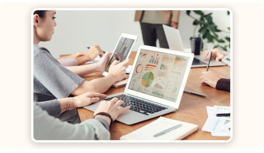 Team analyzing data and charts