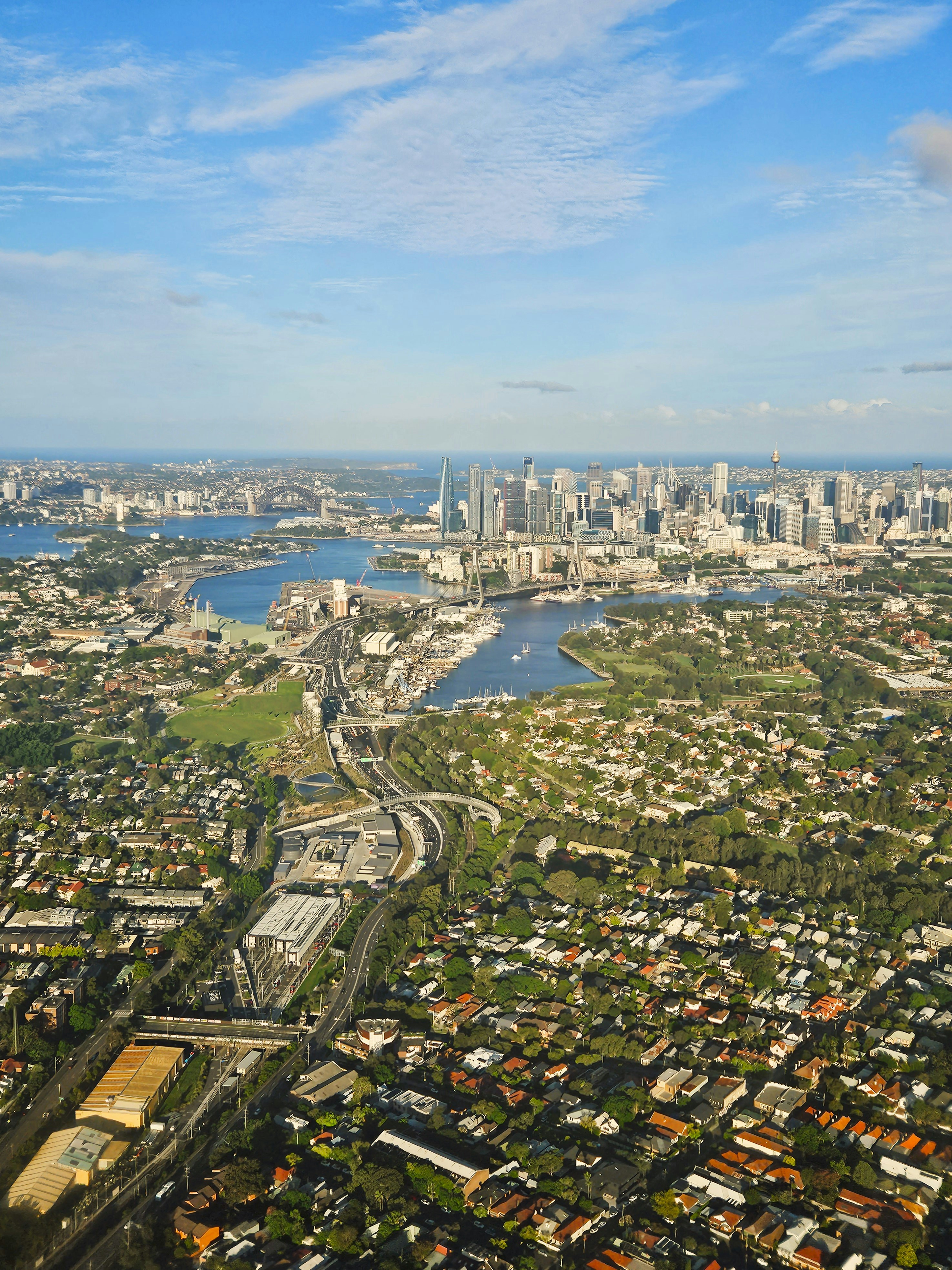 an aerial view of a city and a river
