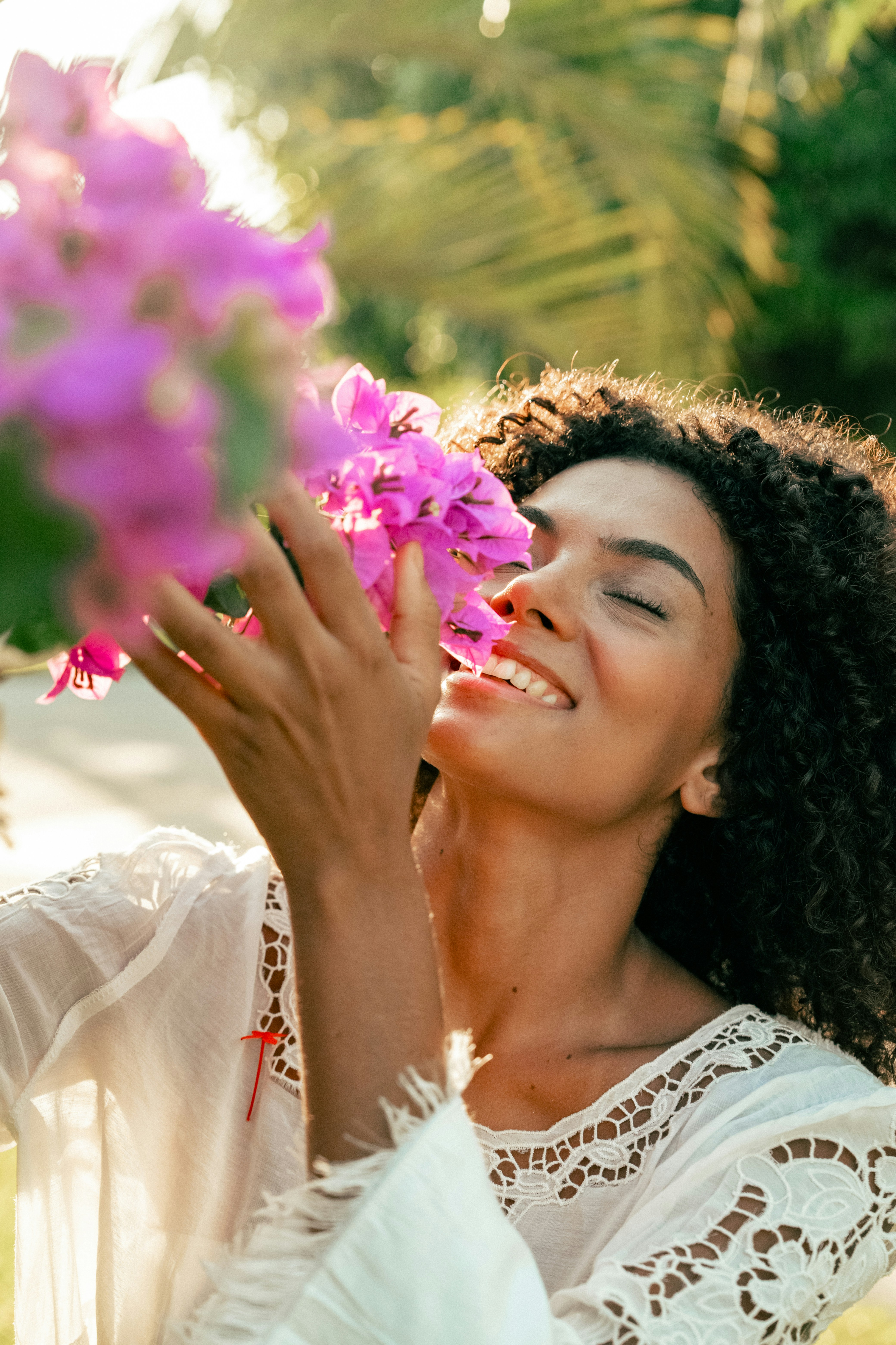 lady smelling flowers