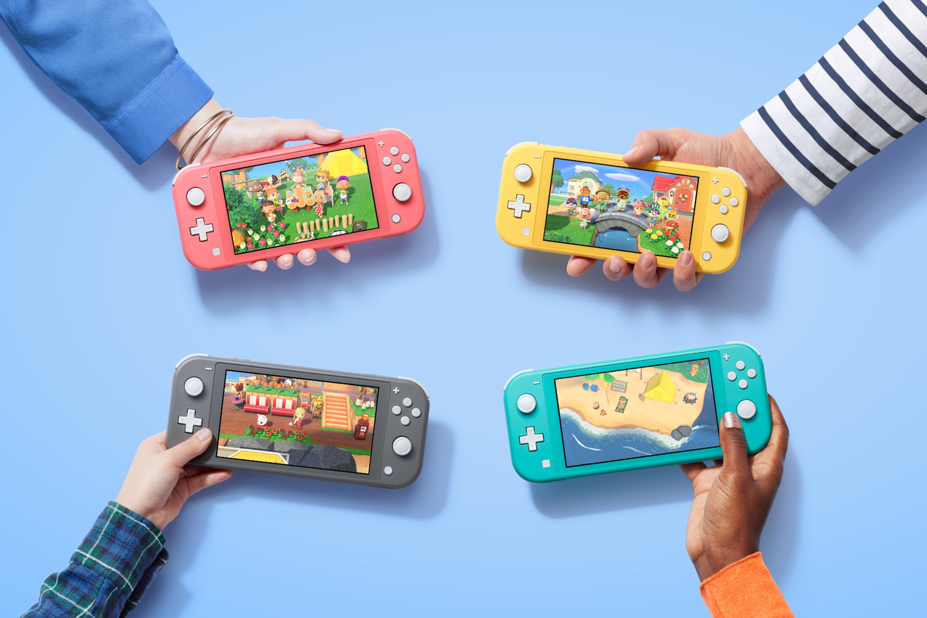4 young childrens' arms are holding Nintendo Switch devices on a bright blue background.