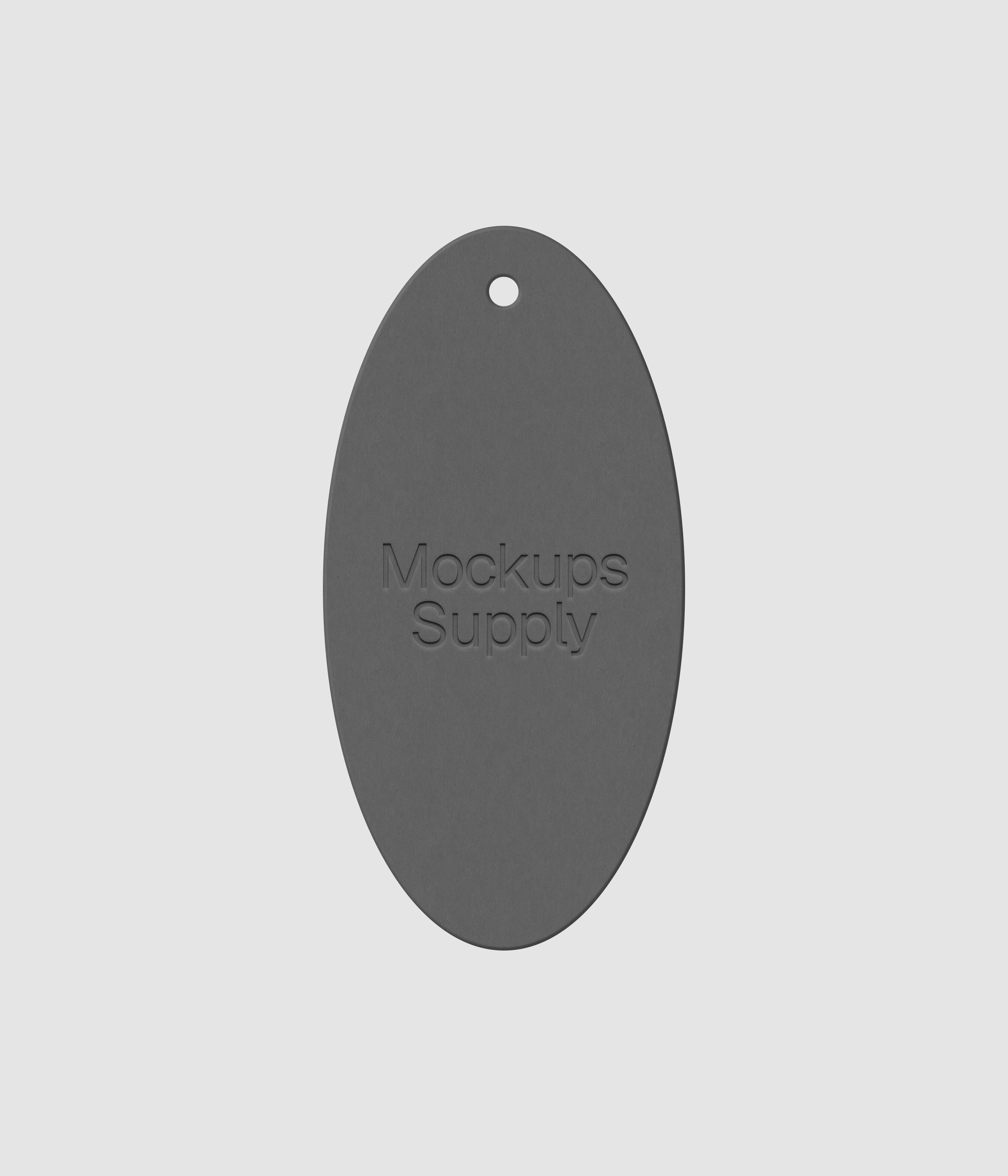 White elongated oval clothing tag featuring embossed logo design on dark backdrop for premium brand identity mockup