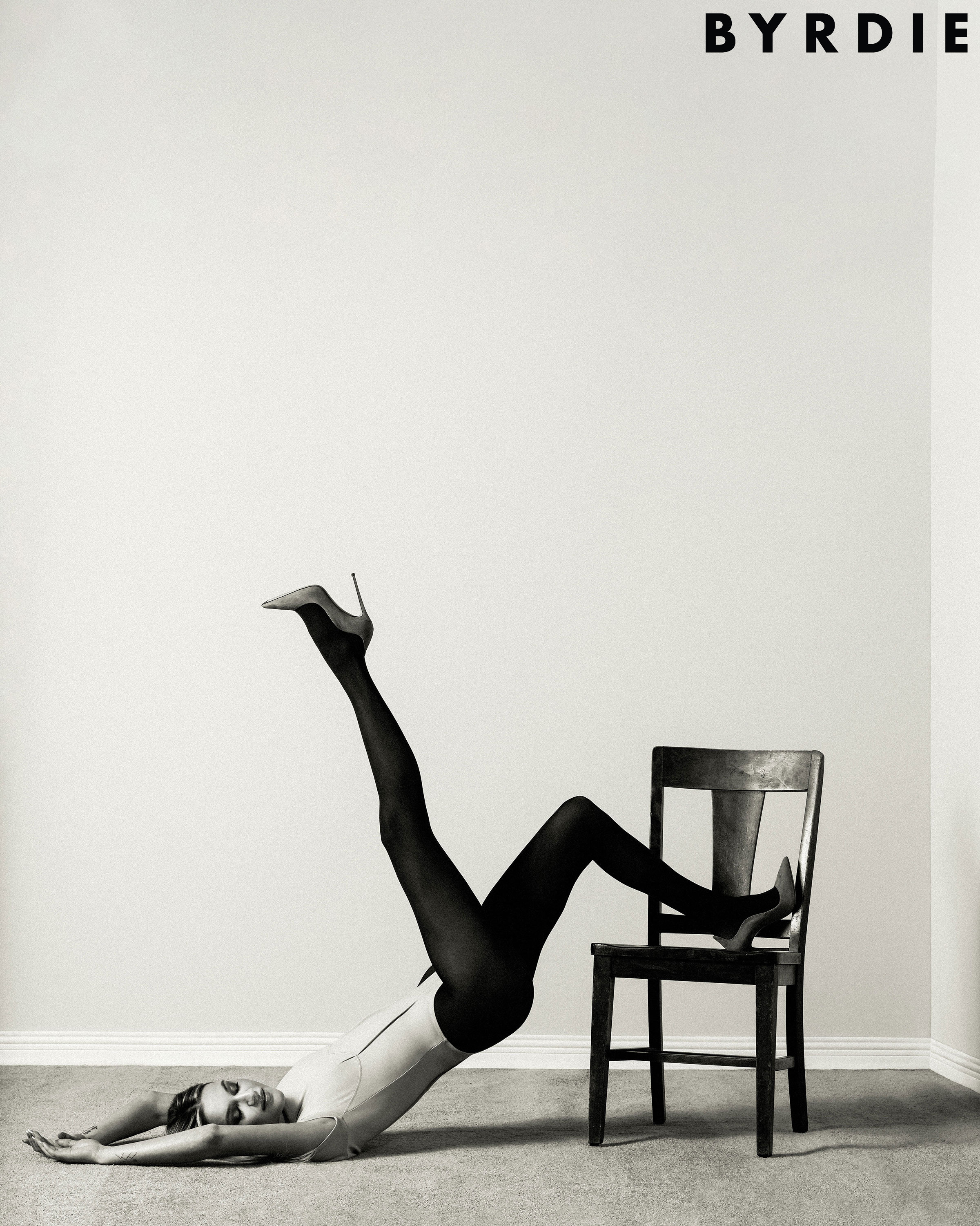 Kelsea Ballerini in a black and white chair portrait