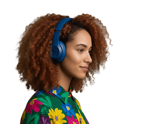 An image of a young professional learning with headphones on