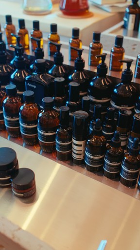 Aesop soap on display in storefront.