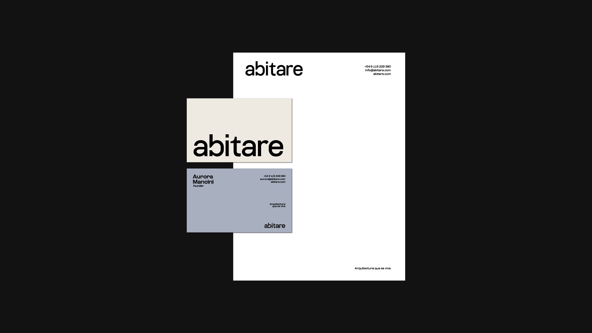 Business stationery set for Abitare architecture studio. Includes a white letterhead and two business cards in cream and dusty blue, featuring clean sans-serif typography on a black background.