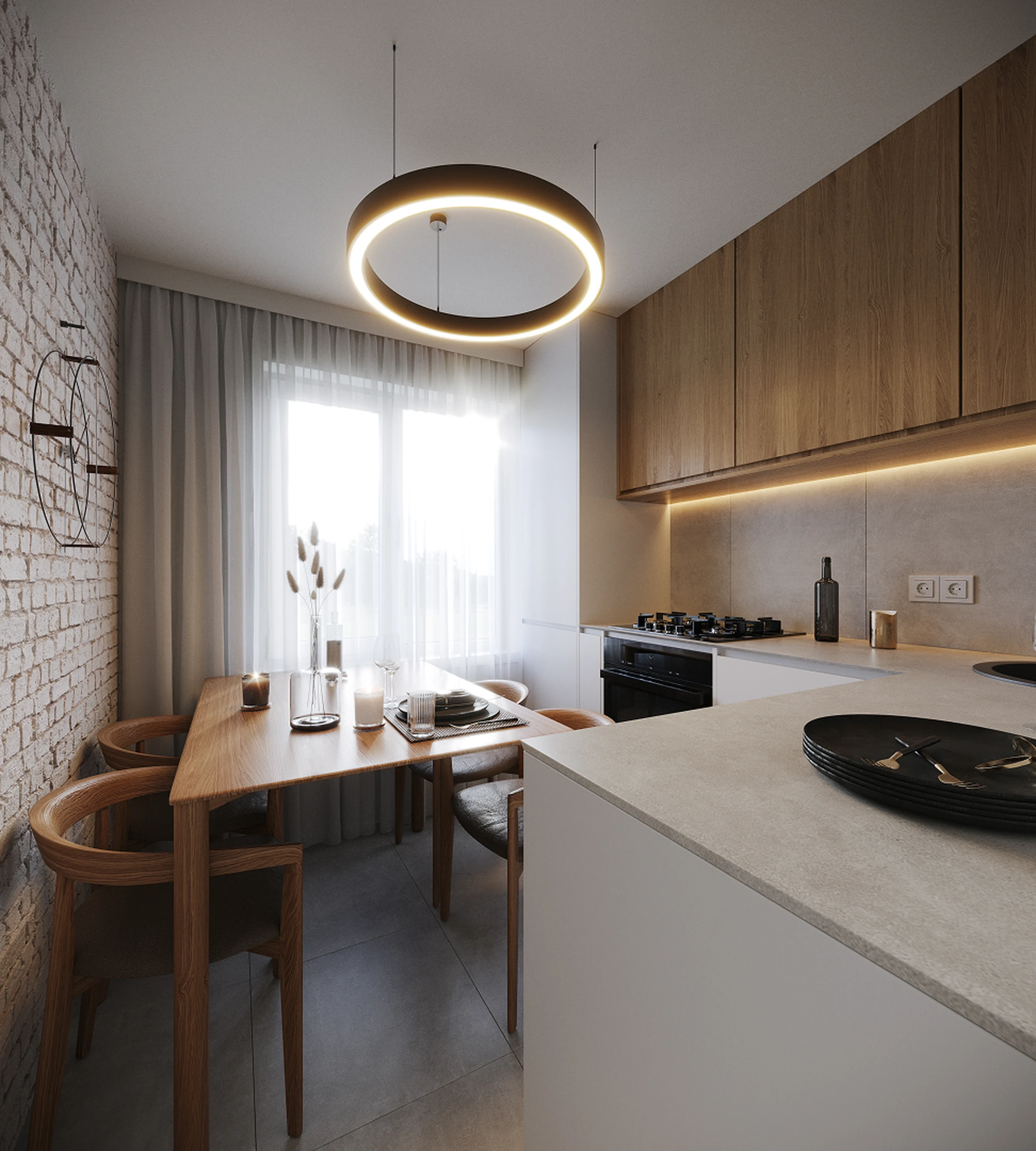 Cuisine — façades lisses et plan de travail en noyer.