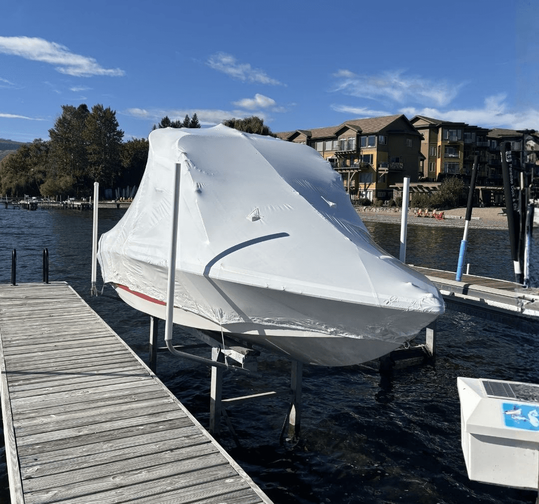 A boat that has been shrink wrapped and protected for winter on dock in Kelowna BC