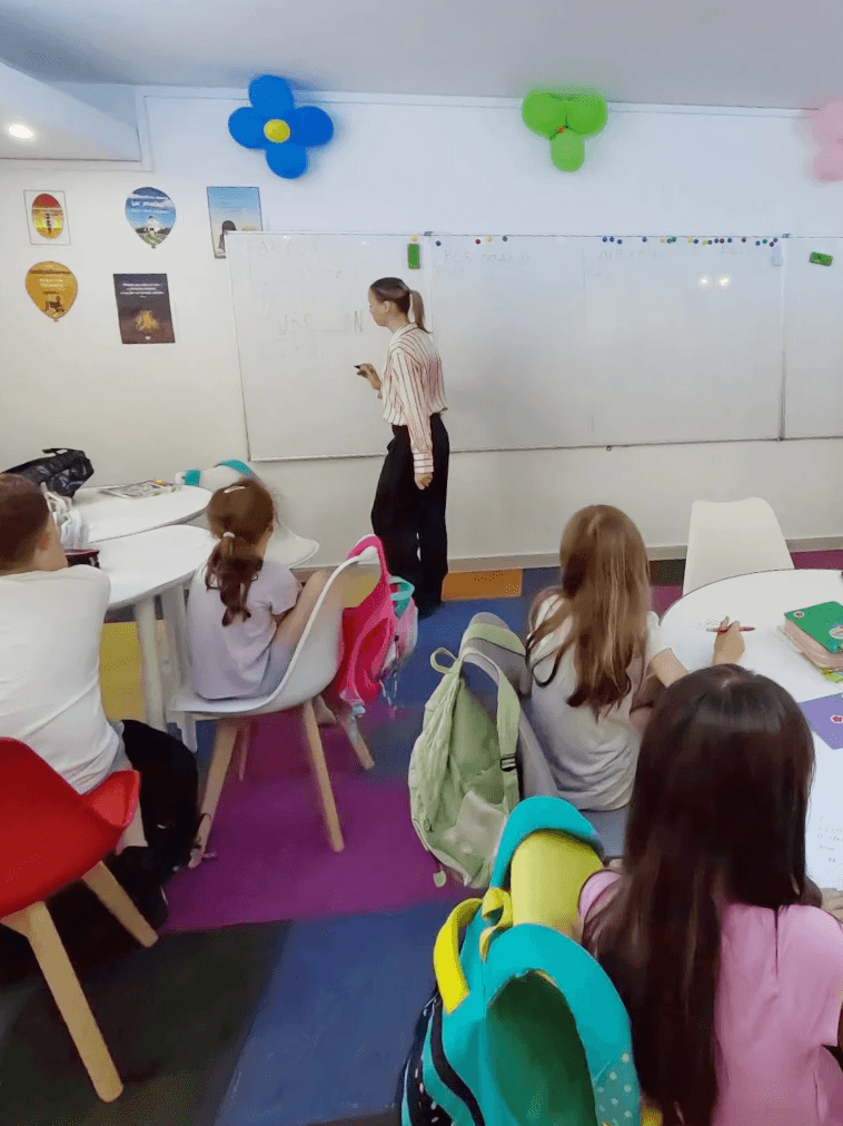 Close-up of evergreen foliage, showcasing vibrant green needles densely packed together.