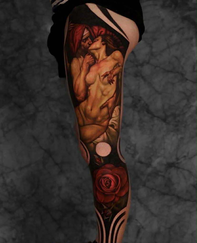 Abstract thigh tattoo of classical bust with geometric lines.