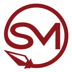 Smiling woman in a blazer and black shirt against a solid brown background.