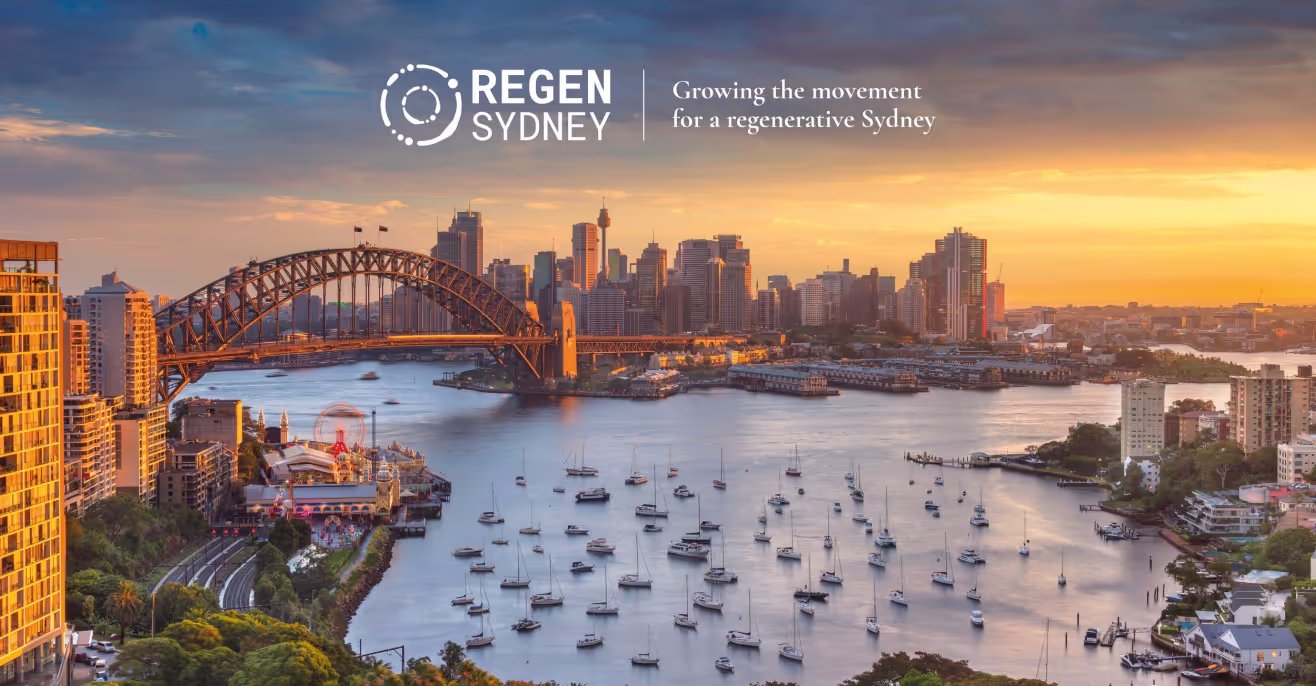 Sydney Harbour at sunset with the Harbour Bridge and moored boats, overlaid with the Regen Sydney logo and the line growing the movement for a regenerative Sydney