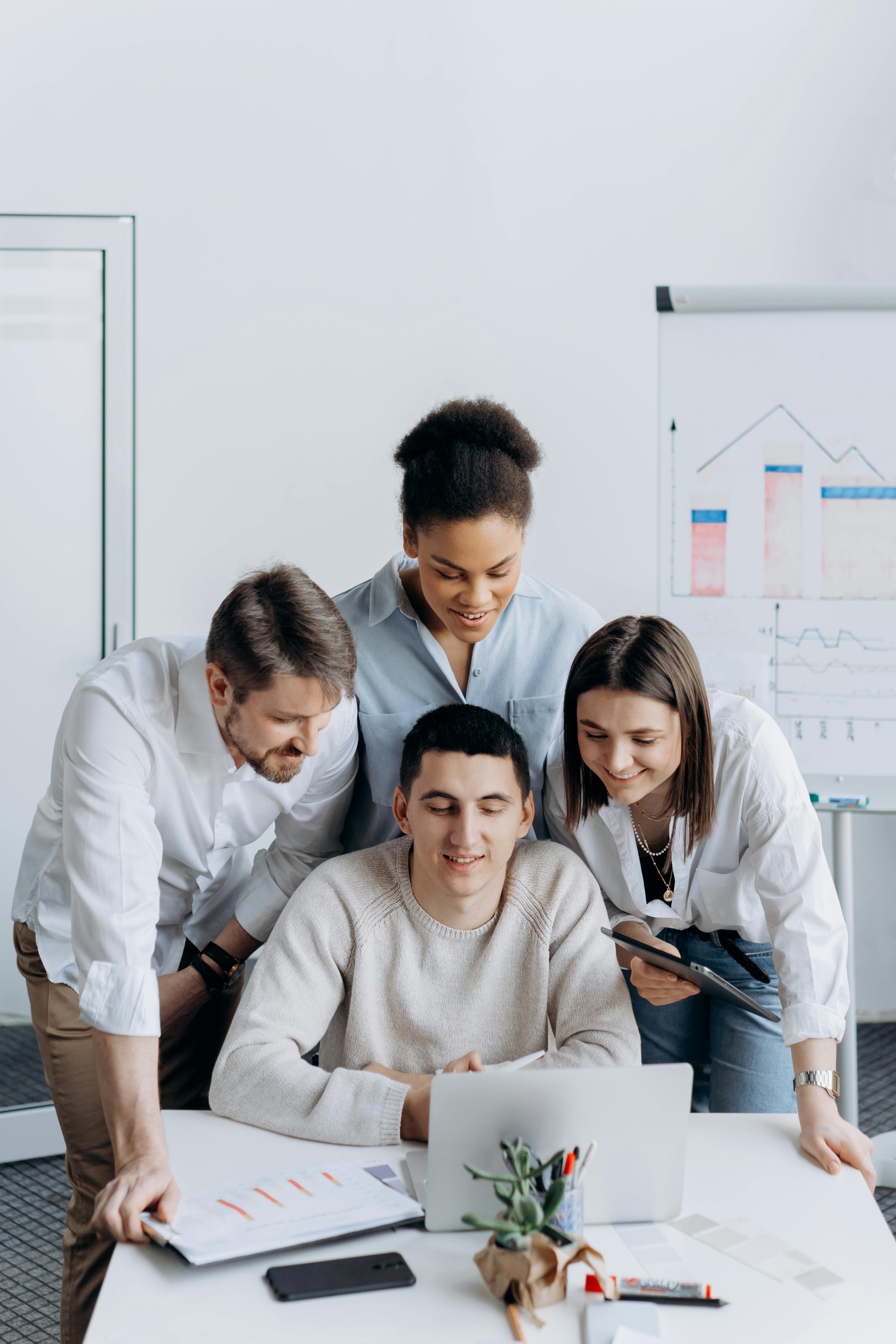 coworkers looking at computer