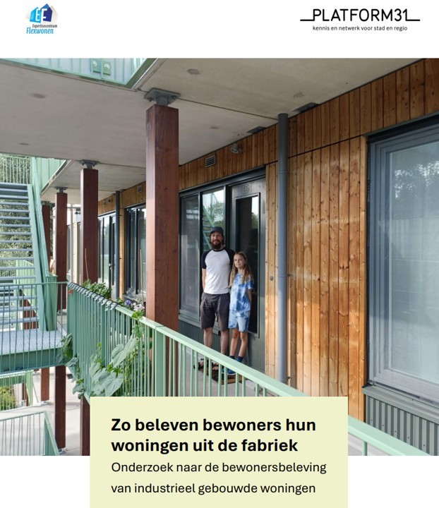 portrait of a male wearing a dark blue sweater on a dark green background