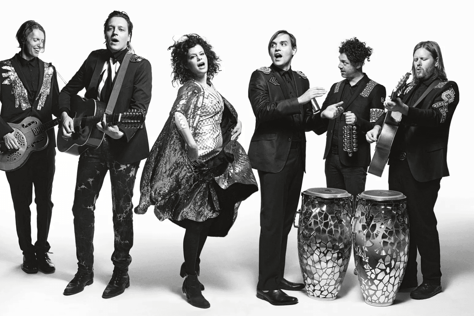 Black and white promo photo of Arcade Fire.