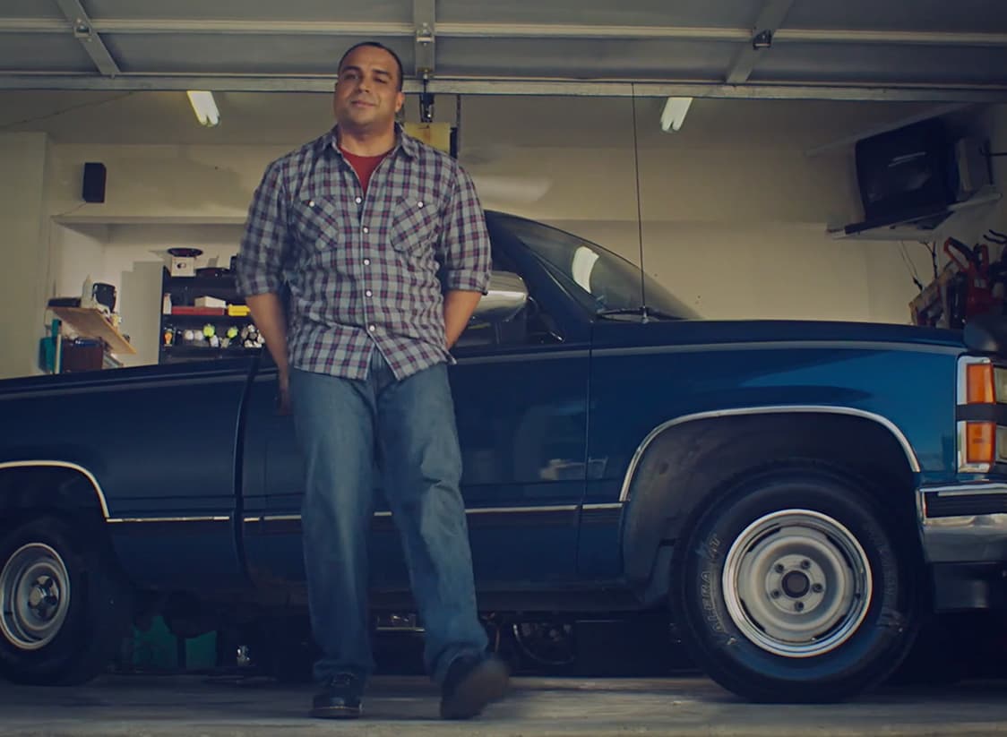 WTADS client NAPA truck owner standing by truck.