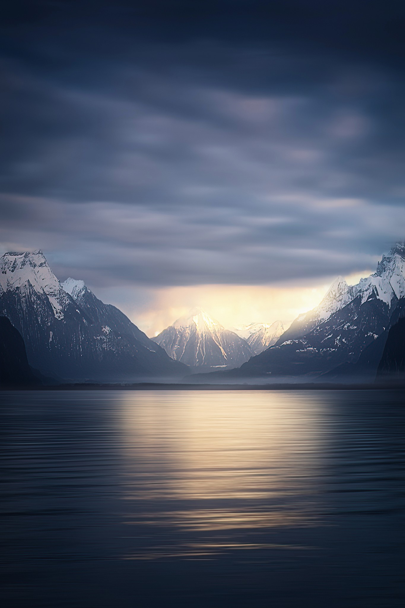 Colorful canyon formation with bright light opening at the top