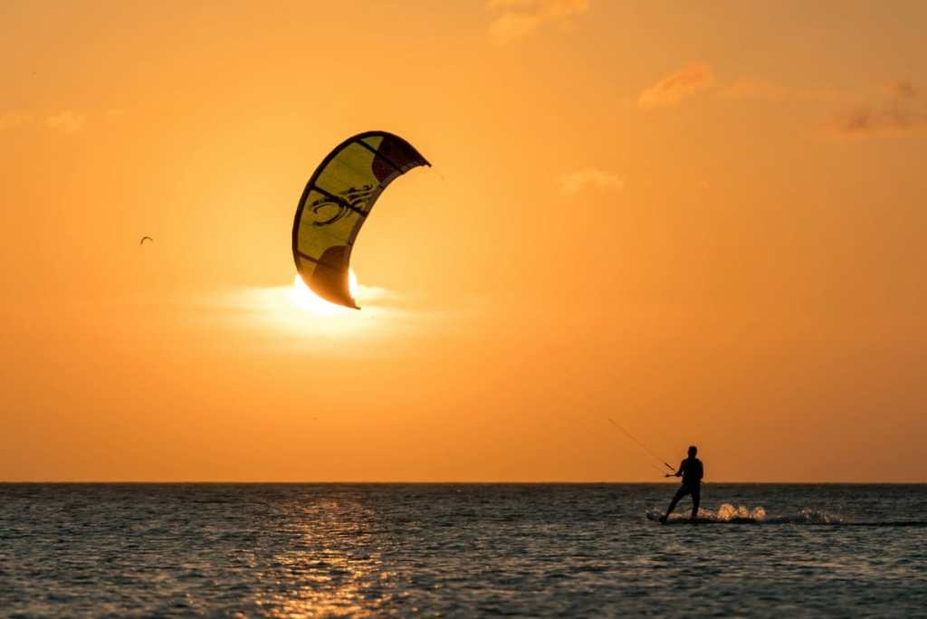 kite surfing at sunset