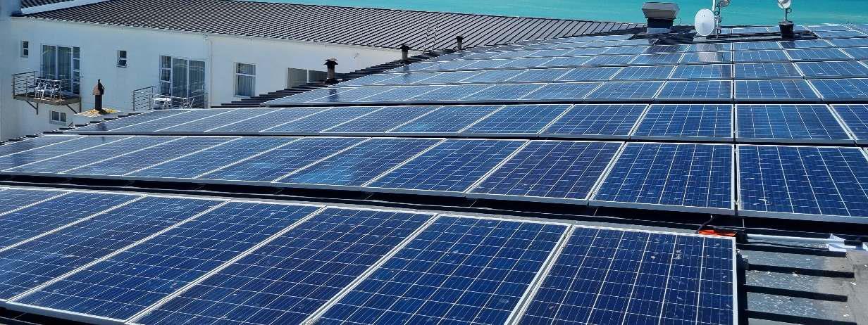 a man standing in a kitchen preparing food
