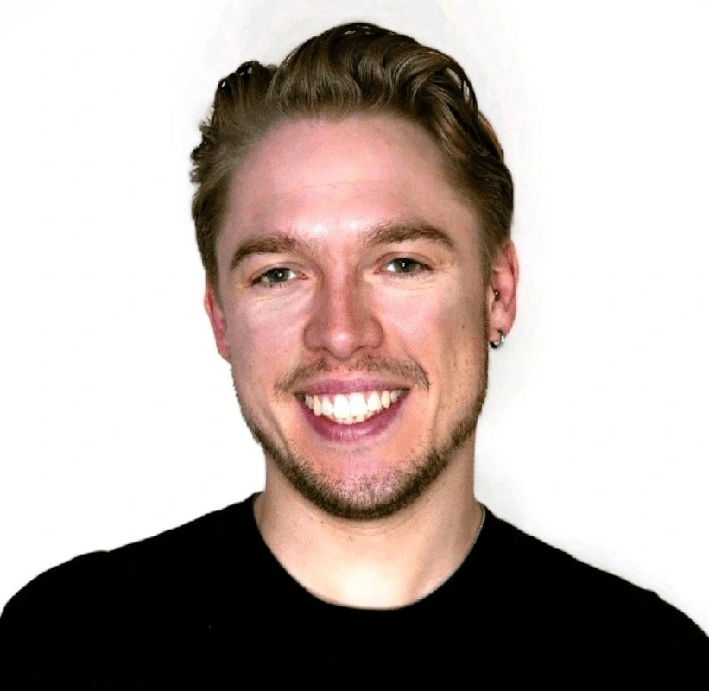 A professional headshot of Richard Palmer