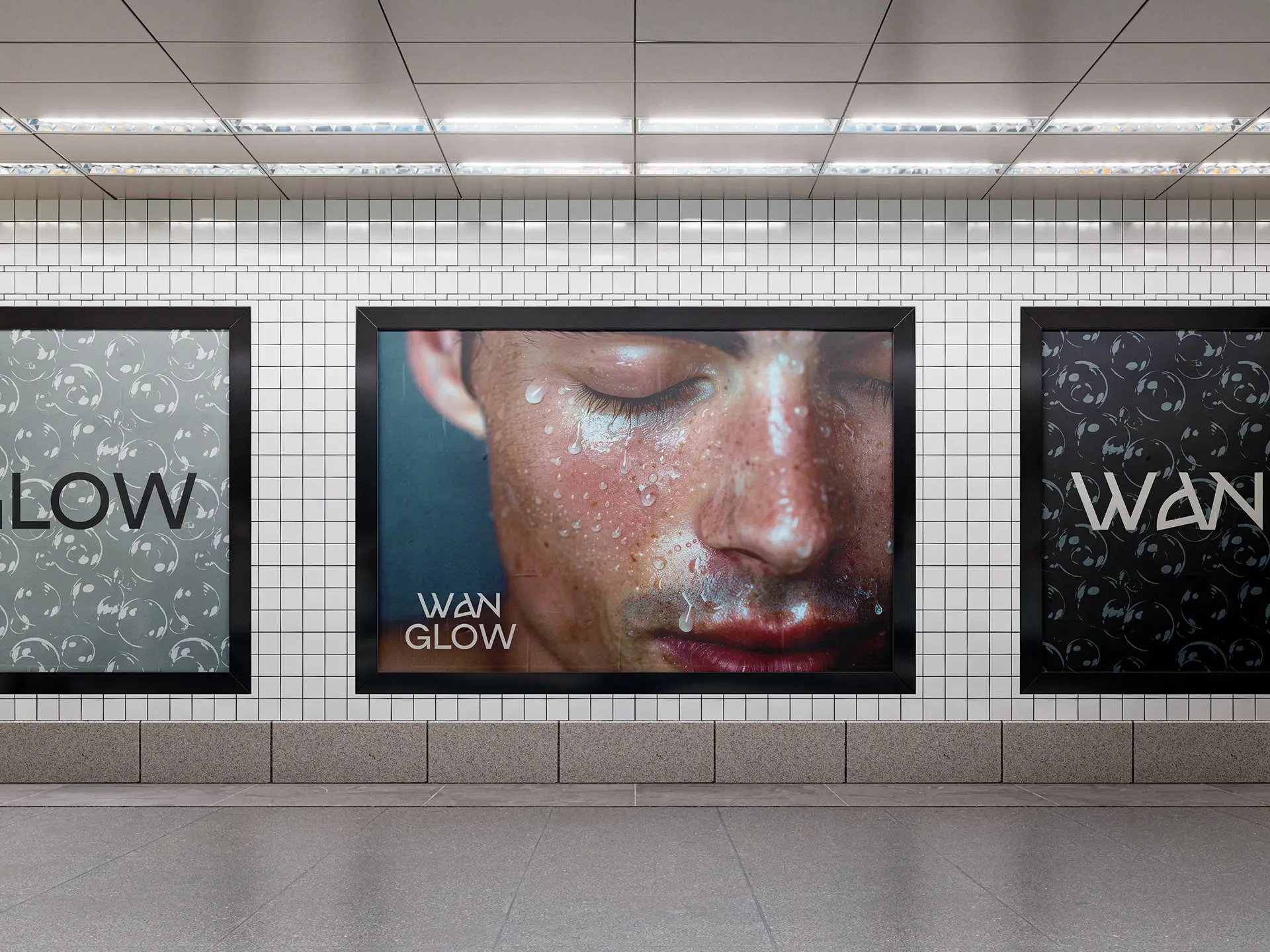 Outdoor advertising campaign for Wanglow men's skincare brand showing brand identity applied to subway billboard posters