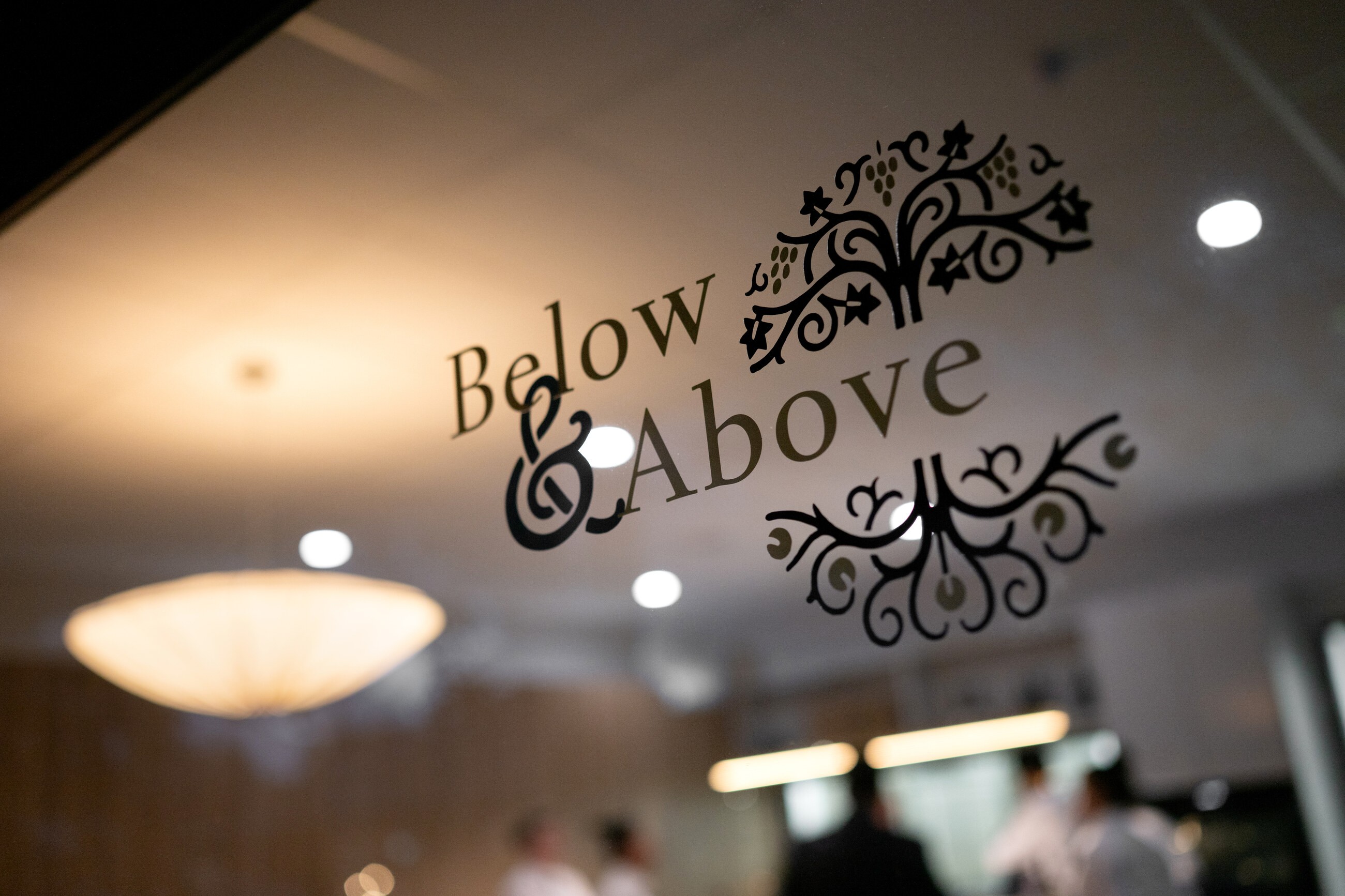 Below&Above signage at a hospitality event