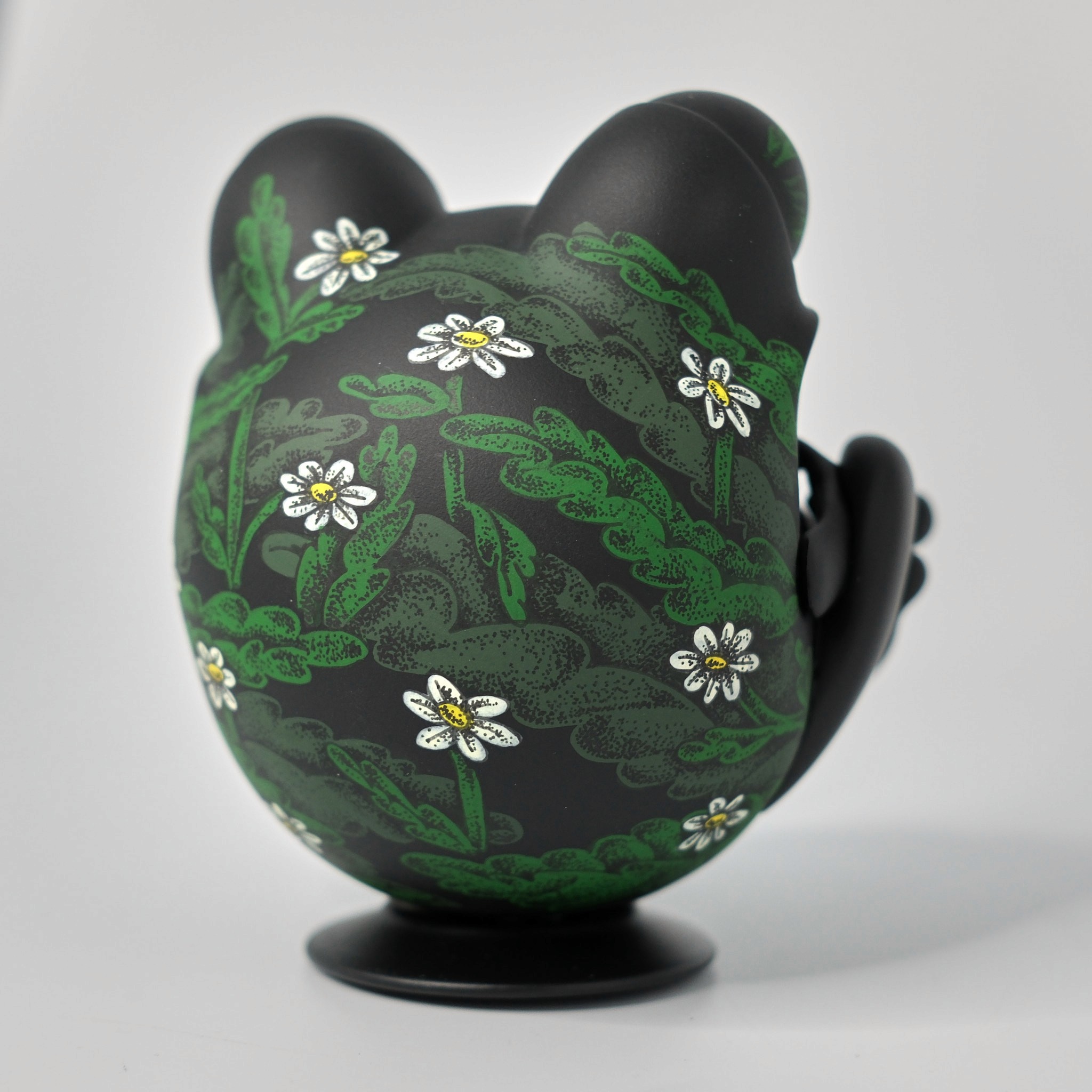 Custom Tegooroo frog figure with white dotted floral pattern