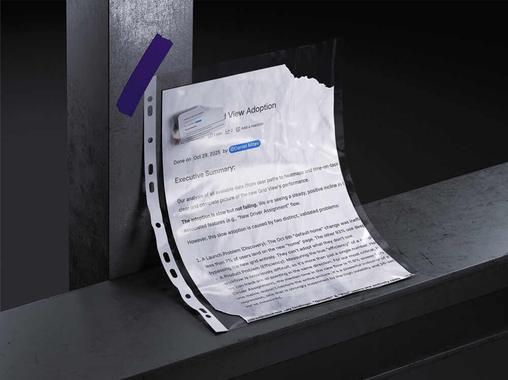 Printed UX analysis document showing adoption metrics and validation notes used to evaluate design changes over time