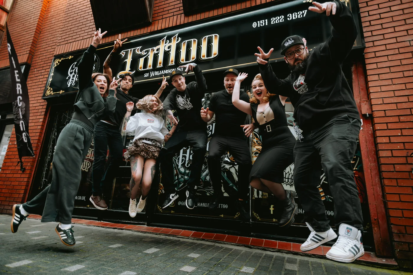 Golden Hands Tattoo team outside the studio in Liverpool
