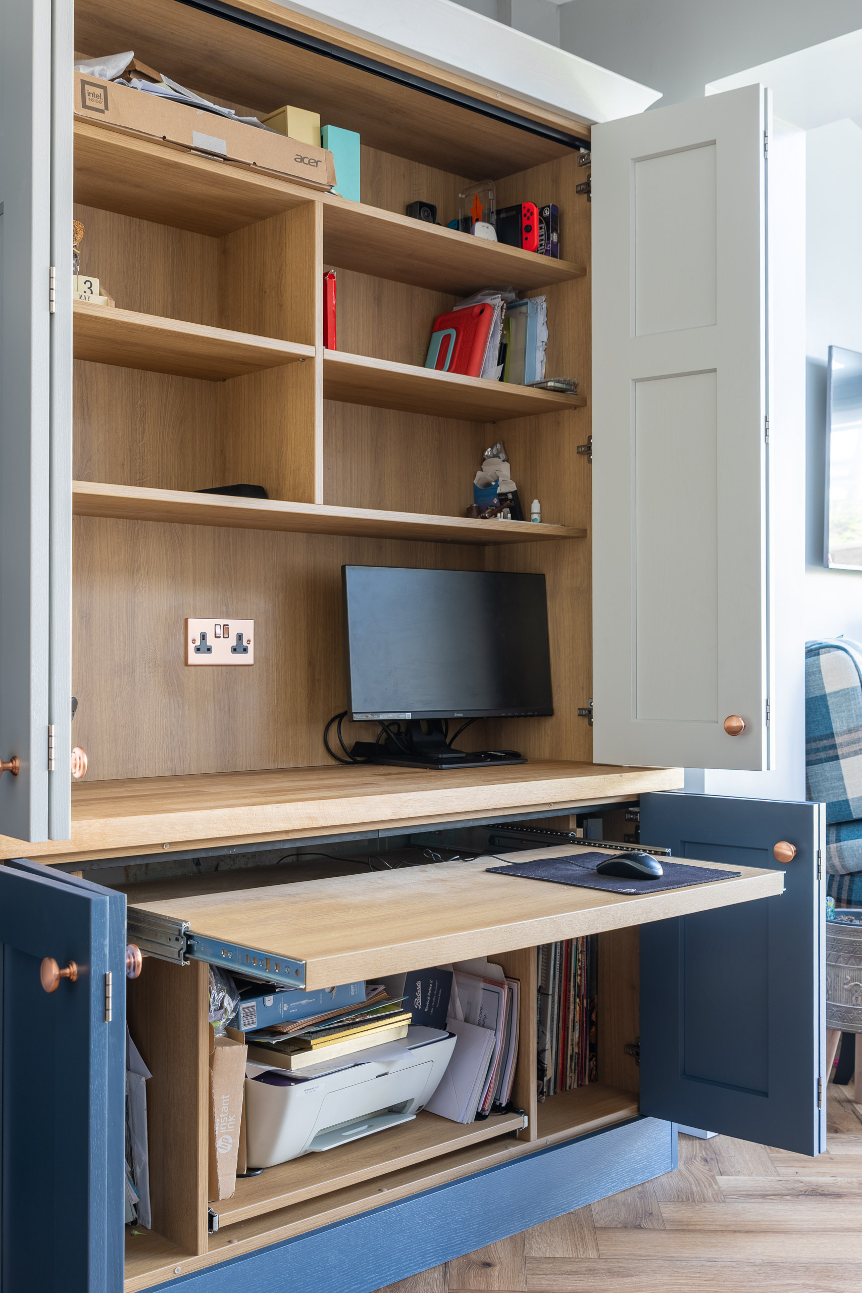 bespoke work station in blue shaker kitchen