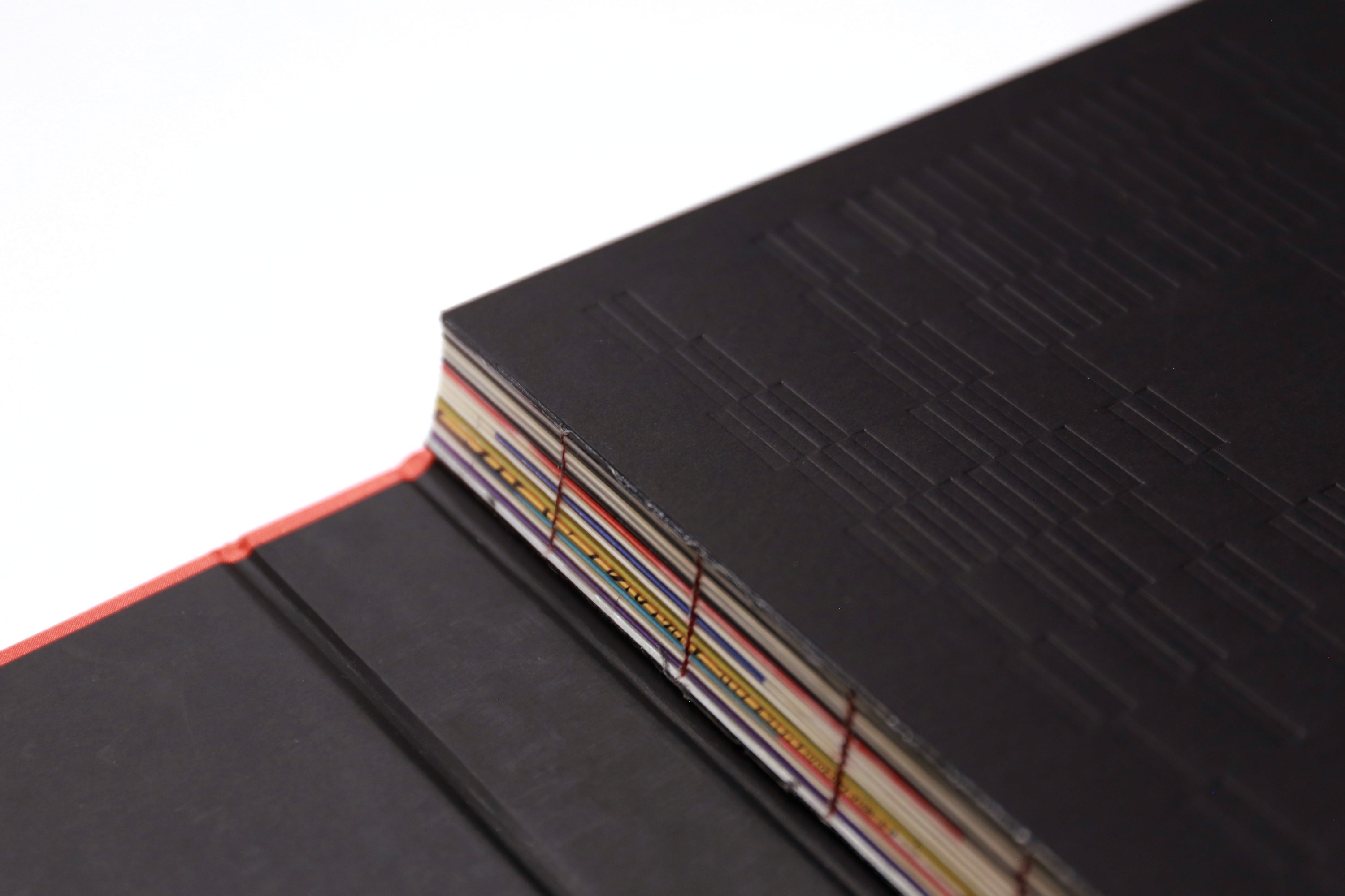 Streetside billboard with flyposters of the Batch.Works brand and illustrations