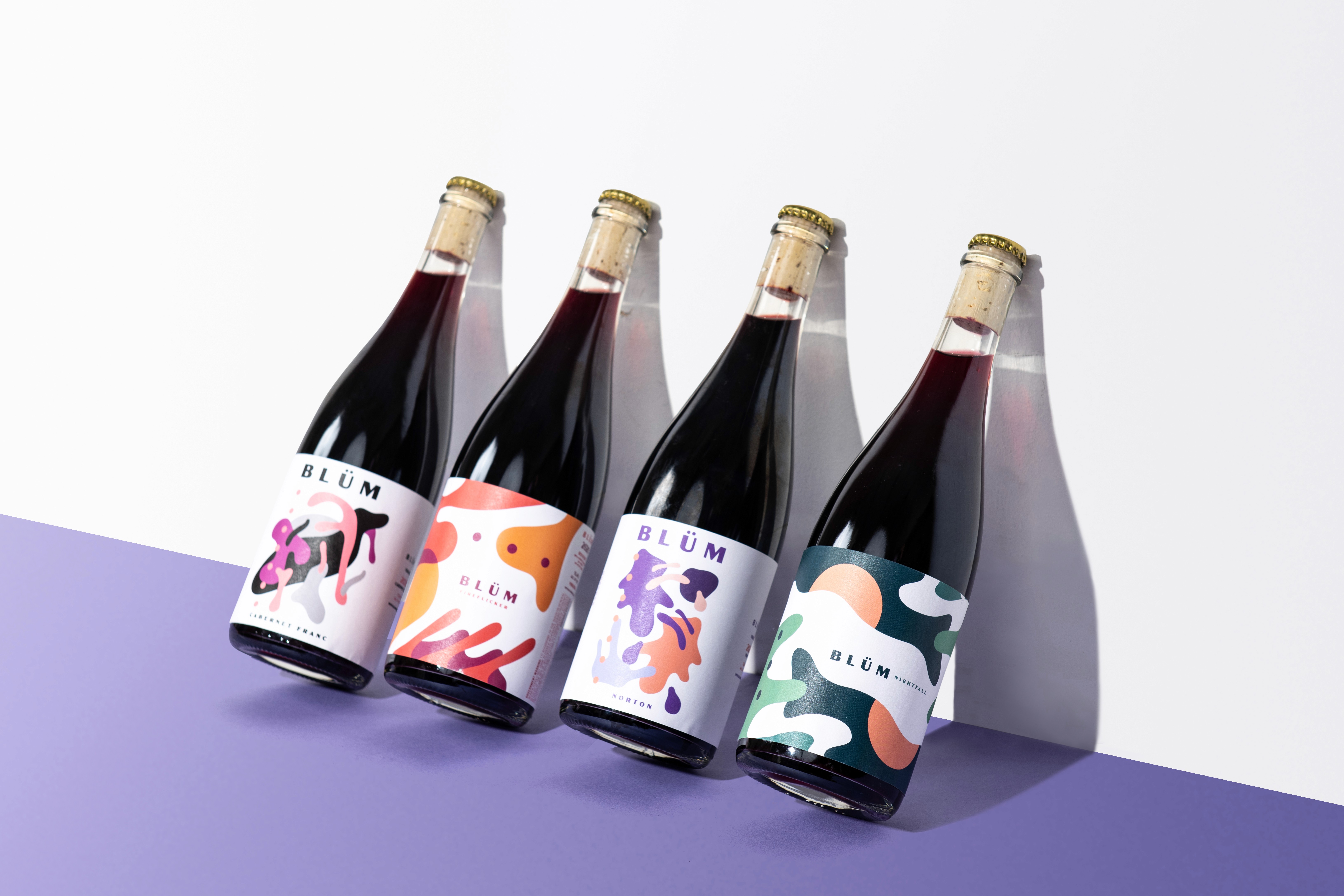 Blum red natural wine bottle lineup