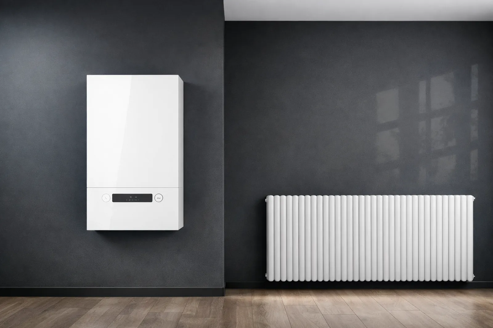 Caldaia a condensazione installata a parete con radiatore in ambiente moderno