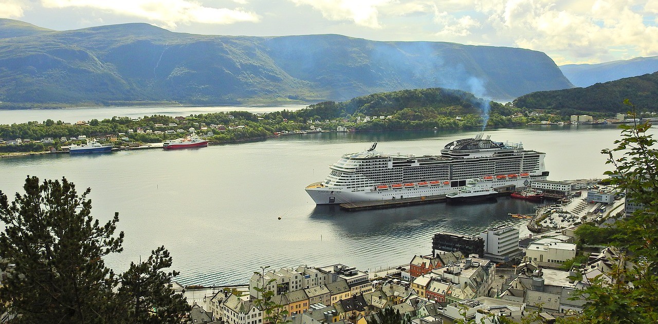 people sitting on chair in front of laptop computers