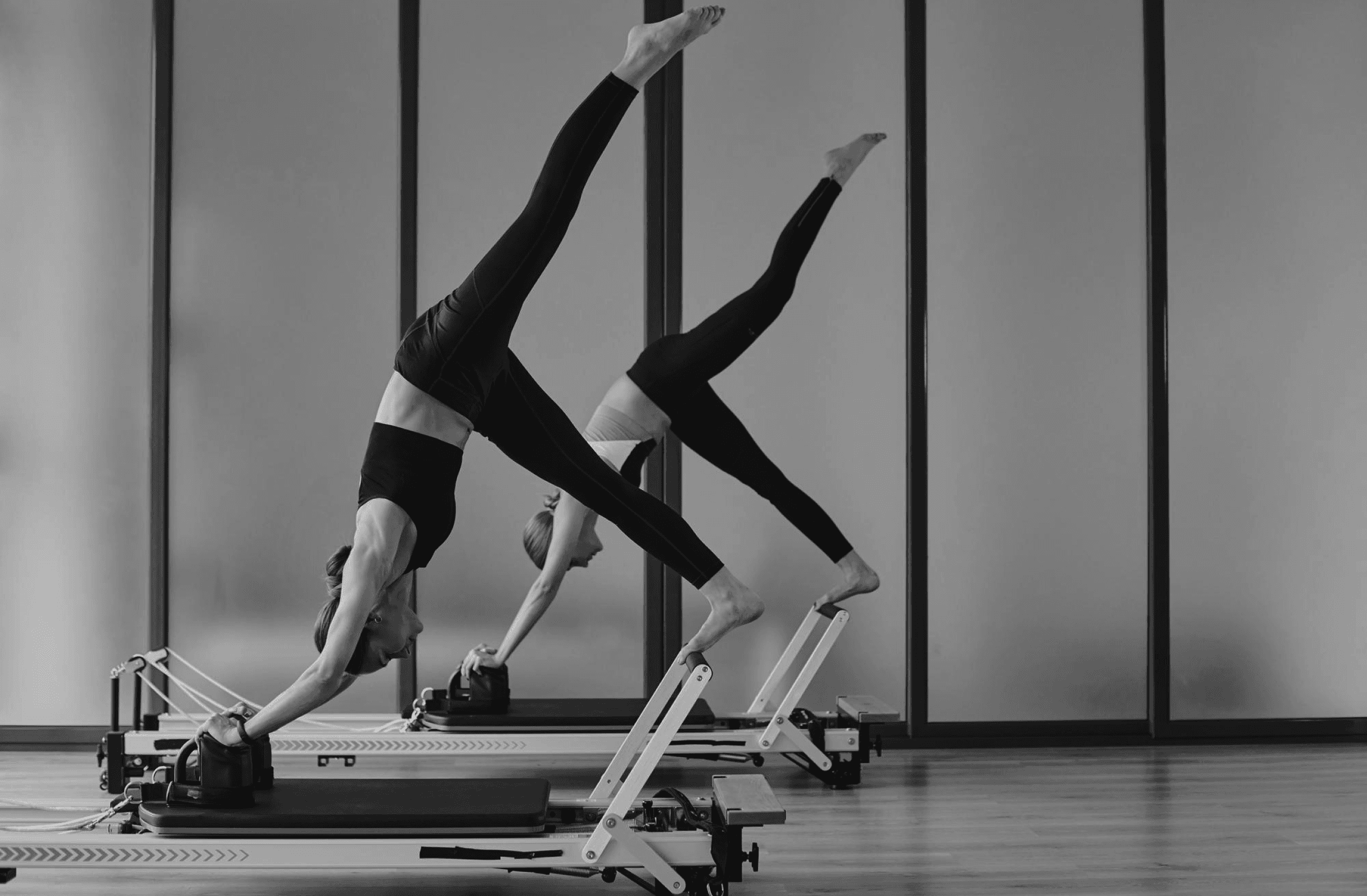 Confident women balancing body during pilates workout